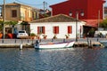 White Runabout Boat Moored on Lefkada Waterfront, Greece Royalty Free Stock Photo