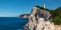 Lefkada island sea coast lighthouse on rocky cliff Royalty Free Stock Photo