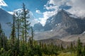 Lefroy Peak in Canadian Rockies lit by sunlight on a partly cloudy day. Mt.Lefroy viewed from the Plain of Six Glaciers trail, Royalty Free Stock Photo