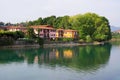 The left bank of Oglio river and a part of Paratico town, seen from the bridge who connect the cities Sarnico and Paratico.