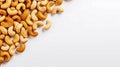 A Left Corner Border From Above Of Roasted Cashew Nuts Isolated Against A Transparent Background. PNG. Party Food Snacks Royalty Free Stock Photo