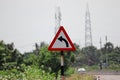 Left curve traffic sign on the side of National Highway Road Royalty Free Stock Photo