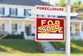 Left Facing Foreclosure Sold For Sale Real Estate Sign in Front Royalty Free Stock Photo