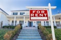 Left Facing For Rent Real Estate Sign In Front of House. Royalty Free Stock Photo