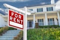 Left Facing For Rent Real Estate Sign In Front of House. Royalty Free Stock Photo