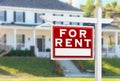 Left Facing For Rent Real Estate Sign In Front of House. Royalty Free Stock Photo