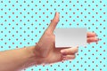 Left Female Hand Hold Blank White Card Mock-up. SIM Christmas Gift. Loyalty Shop Card. Plastic Transport Ticket. Transponder NFC Royalty Free Stock Photo