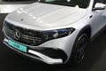 Left front view of Mercedes Benz EQB, seven seat compact electric battery powered crossover SUV car, white colour