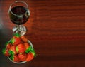 A glass of red wine and strawberries Royalty Free Stock Photo