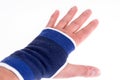 Left hand with a blue bandage Royalty Free Stock Photo