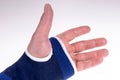 Left hand with a blue bandage Royalty Free Stock Photo