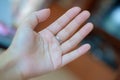 Left hand on blurred background Royalty Free Stock Photo