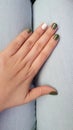 Left hand with green nails Royalty Free Stock Photo