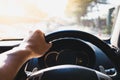 The left hand of the man holding the steering wheel Royalty Free Stock Photo