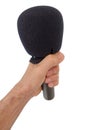 Left hand with microphone isolated on white background Royalty Free Stock Photo