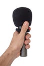 Left hand with microphone isolated on white background Royalty Free Stock Photo