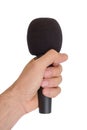 Left hand with microphone isolated on white background Royalty Free Stock Photo