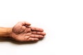 An   left hand reaches in frame left with palm open  on a white background Royalty Free Stock Photo