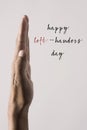 Left hand and text happy left-handers day Royalty Free Stock Photo