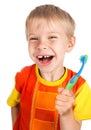 Left-handed smiley boy with toothbrush Royalty Free Stock Photo