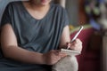 Woman writing on small notepad Royalty Free Stock Photo