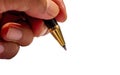 Left handed writing with a gold pen Royalty Free Stock Photo