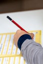 Left handed young boy working on his homework Royalty Free Stock Photo