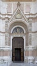 Left portal of the The Basilica of San Petronio in the Main Square of Bologna, Italy. Royalty Free Stock Photo