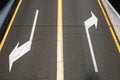 Left / right, direction arrows on asphalt road Royalty Free Stock Photo