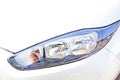 Left Side Closeup Of Vehicle Front Headlamp Assembly Royalty Free Stock Photo