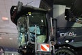 Left view of of modern american large scale combine half track agricultural harvester Massey Ferguson MF Ideal