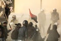Leftist and anarchist groups seeking the abolition of new maximum security prisons, clashed with riot police