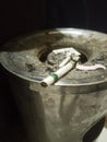Leftover cigarettes on big ashtray