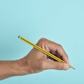 Lefty man with a pencil Royalty Free Stock Photo