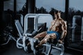 Leg Exercises - Man Doing Leg With Machine In Gym