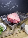 Leg of lamb with ingredients for roast lamb Royalty Free Stock Photo