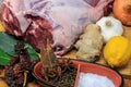 Leg of lamb with marinade ingredients Royalty Free Stock Photo