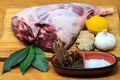 Leg of lamb with marinade ingredients Royalty Free Stock Photo