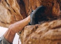 Leg of man climbing rock, mountain or stone for workout, adventure or exercise. Bouldering, sport and fitness of male Royalty Free Stock Photo