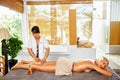 Leg Massage Spa Therapy. Body Care. Masseur Massaging Female Leg Royalty Free Stock Photo
