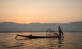 Leg-Rowing Fisherman at sunrise, Inle Lake, Shan State, Myanmar Royalty Free Stock Photo