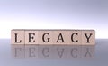 LEGACY concept, wooden word block on the grey background Royalty Free Stock Photo