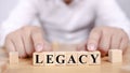 Legacy, text words typography written with wooden letter, life and business motivational inspirational Royalty Free Stock Photo