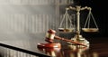 Legal concept: Scales of justice and and the judge's gavel hammer as a symbol of law and order on the background of