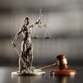 Legal Concept: Themis is the goddess of justice and the judge's gavel hammer as a symbol of law and order on the