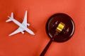 Legal concepts represented by Judge gavel, airplane model on airline litigation