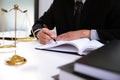 Legal counsel presents to the client a signed contract with gave Royalty Free Stock Photo