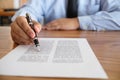 Legal counsel presents to the client a signed contract with gave Royalty Free Stock Photo
