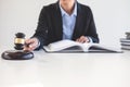 Legal law, advice and justice concept, Professional Female lawyers working on courtroom sitting at the table with gavel and Scale Royalty Free Stock Photo