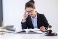 Legal law, advice and justice concept, Professional Female lawyers working on courtroom sitting at the table and signing papers w Royalty Free Stock Photo